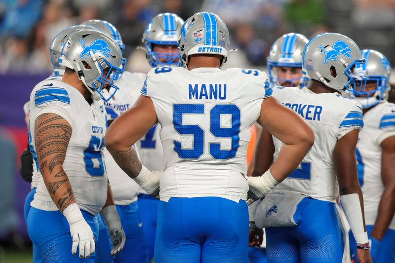 Aug 8, 2024; East Rutherford, New Jersey, USA; Detroit Lions offensive tackle Giovanni Manu (59) in the huddle during the game against the New York Giants at MetLife Stadium. Mandatory Credit: Scott Rausenberger-USA TODAY Sports