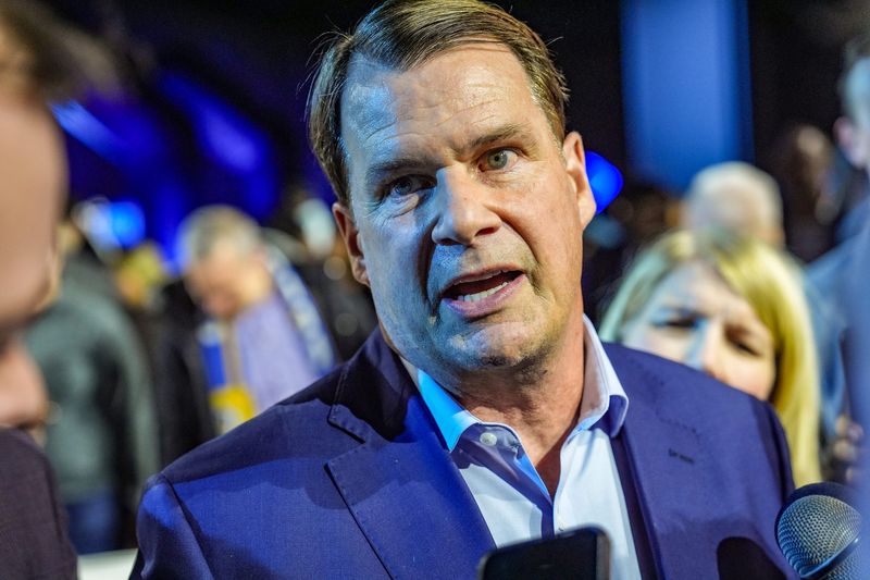 Jim Farley, president and chief executive officer of Ford, talks with the media after Ford kicks off the 2025 Detroit Auto Show with a reveal at Huntington Place in Detroit, Thursday, Jan. 9, 2025.