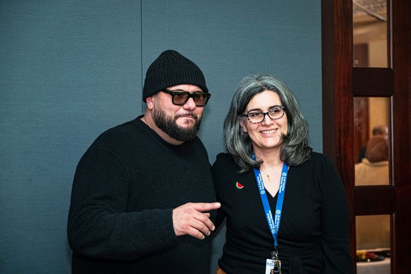 Mo Amer, a Palestinian-American stand-up comedian and actor, with the Arab American National Museum Director Diana Abouali on Friday, Feb. 21, 2025.