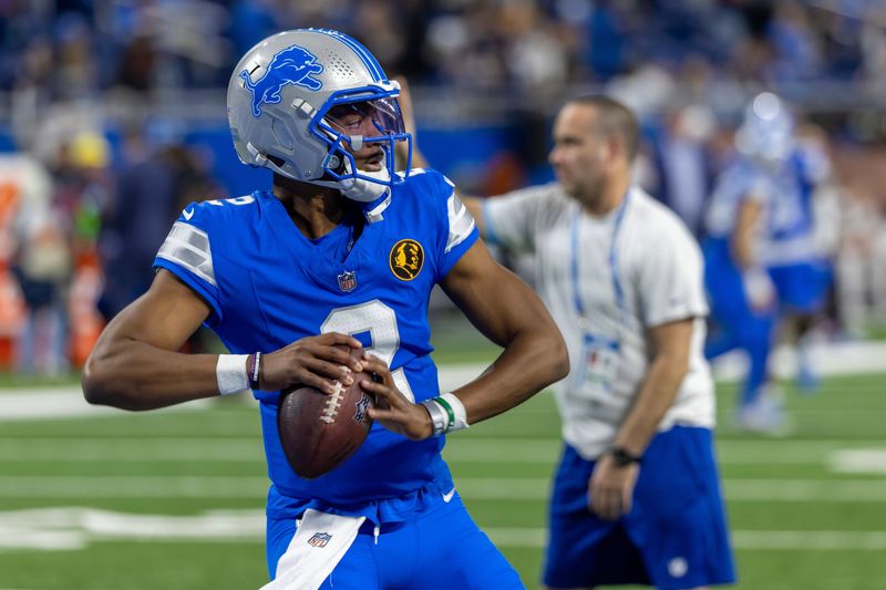 Nov 28, 2024; Detroit, Michigan, USA; Detroit Lions quarterback Hendon Hooker (2) warms up before the game against the Chicago Bears at Ford Field. Mandatory Credit: David Reginek-Imagn Images