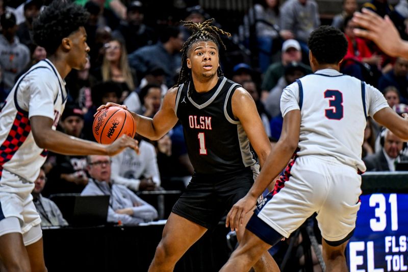Orchard Lake St. Mary's Trey McKenney looks to pass against East Lansing during the third quarter in the Division 1 state semifinal on Friday, March 14, 2025, at the Breslin Center in East Lansing.