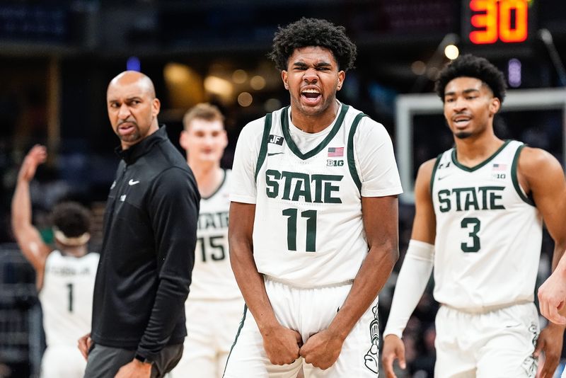 Michigan State guard Jase Richardson (11) celebrates a three point basket against Oregon during the first half of Big Ten Tournament quarterfinal at Gainbridge Fieldhouse in Indianapolis, Ind. on Friday, March 14, 2025.
