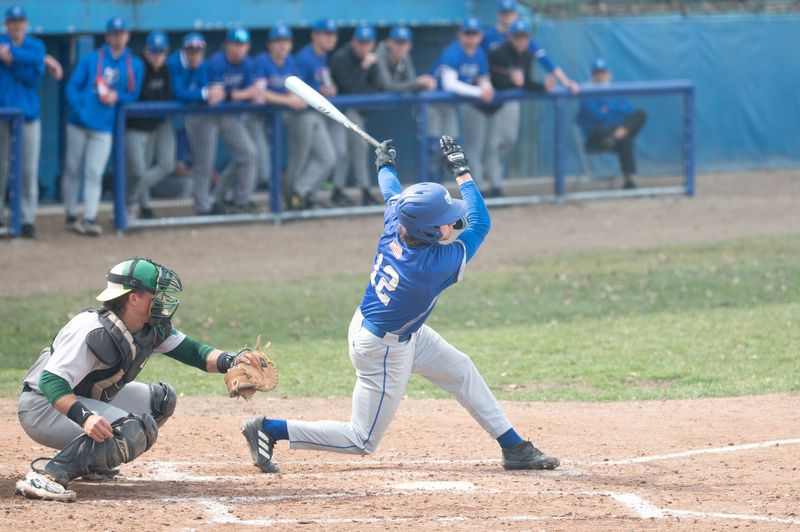 Kellogg freshman Zach Kucharczyk swings at a pitch during a game against Glen Oaks Community College at C.O. Brown Stadium on Tuesday, March 18, 2025.