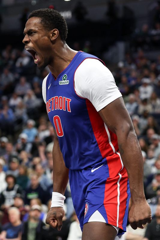 Detroit Pistons center Jalen Duren celebrates his dunk against the Minnesota Timberwolves during the second quarter at Target Center in Minneapolis on Sunday, March 30, 2025.