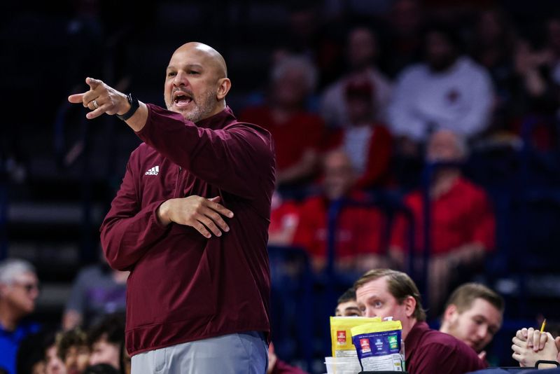 Central Michigan Chippewas head coach Tony Barbee yells and points toward his players during the first half of the game against the Arizona Wildcats at McKale Center in Tucson, Arizona, on Dec. 21, 2024.