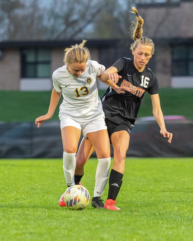 Hartland's Gracie Kastamo (13) and Brighton's Kyla Bobby (16) scored for their soccer teams in KLAA tournament semifinals Tuesday.