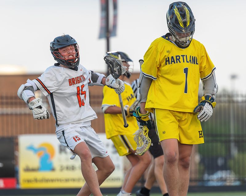 Brighton's Joey Skoczylas (15) celebrates one of his four goals during a 9-7 lacrosse victory over Hartland Wednesday, May 7, 2025.