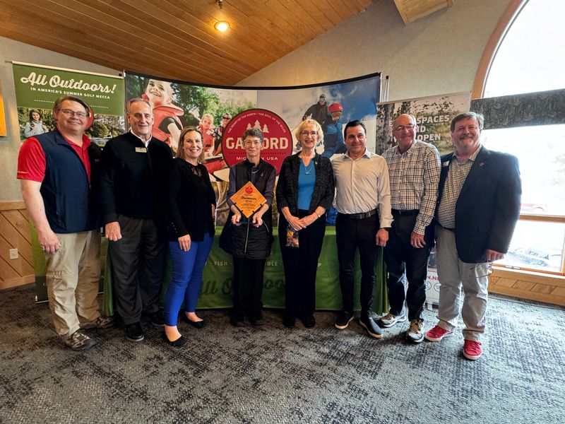 Gaylord Area Convention and Tourism Bureau board members present the Pigeon River Discovery Center with the 2025 Trailblazer Award. Pictured (from left) are Mark Copeland, Barry Owens, Julie Allen, Sandy Franz, Jan Kellogg, Rob Rodenroth, Gary Kosch and Paul Beachnau.
