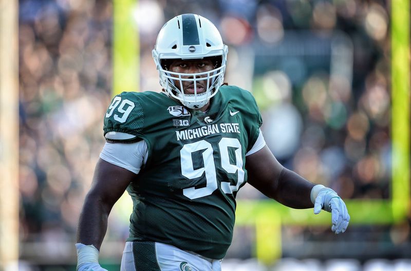 Sep 28, 2019; East Lansing, MI, USA; Michigan State Spartans defensive tackle Raequan Williams (99) stands on the field during the first half of a game against the Indiana Hoosiers at Spartan Stadium. Mandatory Credit: Mike Carter-USA TODAY Sports