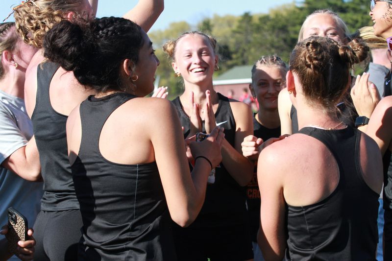 Members of the Sturgis track team celebrate as they were announced as the winning team.