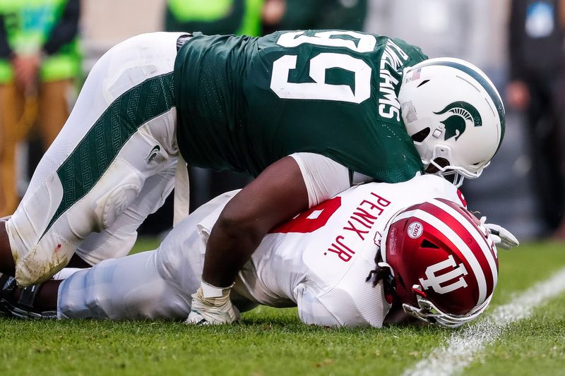 Michigan State defensive tackle Raequan Williams sacks Indiana quarterback Michael Penix Jr. during the second half at Spartan Stadium in East Lansing, Saturday, Sept. 28, 2019.

Raequan Williams