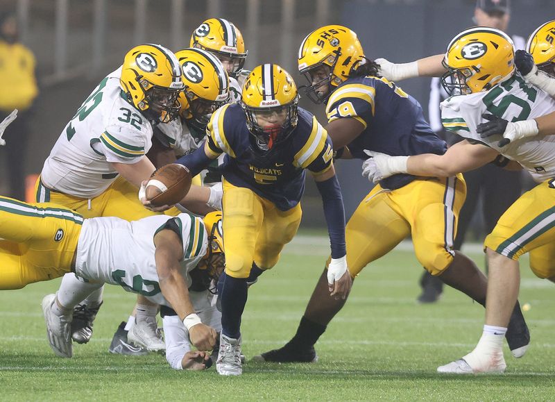 Springfield receiver Aaron Scott runs for a gain in the second half against St. Edward during the Division I state final Friday, Dec. 1, 2023, in Canton.