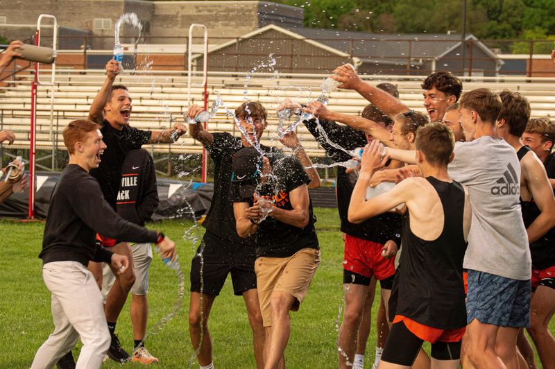 Jonesville congratulates coach Pete Konieczki after the team was named the Region 25.