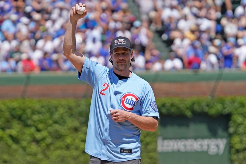 May 16, 2025; Chicago, Illinois, USA; Former Chicago Blackhawks player Duncan Keith throws out the first pitch before a game between the Chicago Cubs and the Chicago White Sox at Wrigley Field. Mandatory Credit: David Banks-Imagn Images