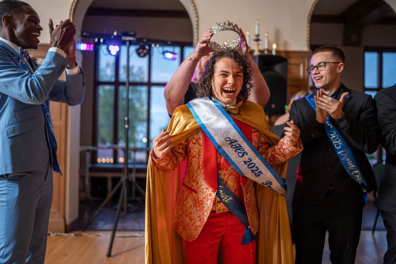 Annapolis High School senior Jude Sears reacts while being crowned as the prom king during Annapolis High School’s prom held at the Detroit Yacht Club on Bell Isle in Detroit on Thursday, May 29, 2025.