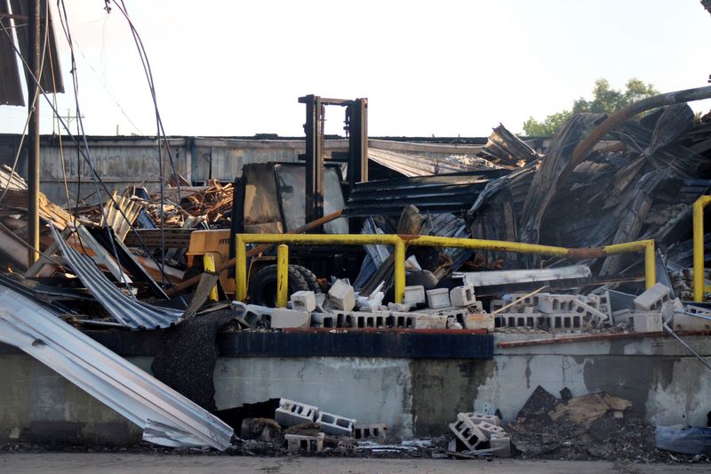 The remains of a storage facility near the paper mill in Cheboygan are visible on Sept. 18, 2023 following a fire.