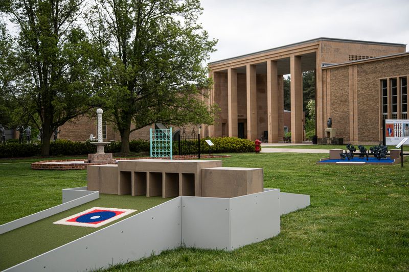 Hole 9: Peristyle Playthrough at the Cranbrook on the Green, an artist-designed mini-golf course outside of the Cranbrook Art Museum in Bloomfield Hills on Friday, May 20, 2022.