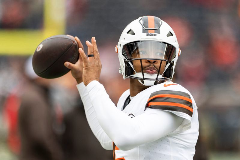 Dec 15, 2024; Cleveland, Ohio, USA; Cleveland Browns quarterback Jameis Winston (5) throws the ball during warm ups against the Kansas City Chiefs at Huntington Bank Field. Mandatory Credit: Scott Galvin-Imagn Images