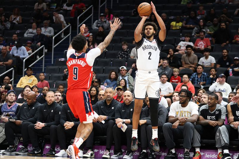 Mar 29, 2025; Washington, District of Columbia, USA; Brooklyn Nets forward Cameron Johnson (2) takes a shot over Washington Wizards forward Justin Champagnie (9) during the first half at Capital One Arena. Mandatory Credit: Daniel Kucin Jr.-Imagn Images