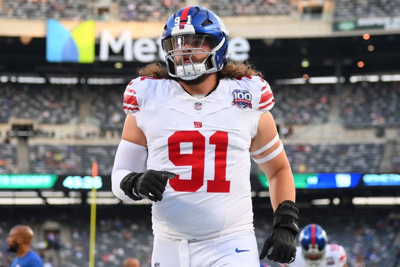 Aug 24, 2024; East Rutherford, New Jersey, USA; New York Giants defensive tackle Casey Rogers (91) warms up prior to the game against the New York Jets at MetLife Stadium. Mandatory Credit: Rich Barnes-USA TODAY Sports