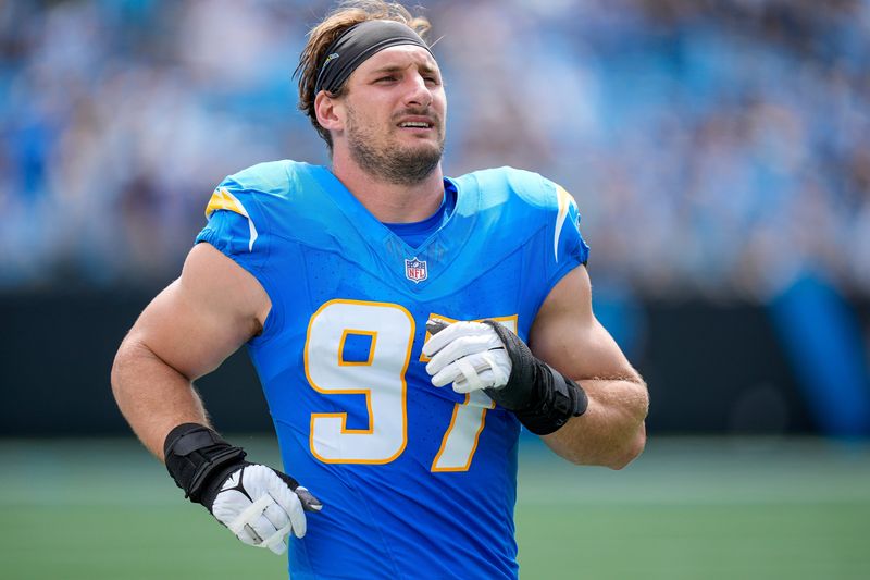 Sep 15, 2024; Charlotte, North Carolina, USA; Los Angeles Chargers linebacker Joey Bosa (97) during the first quarter against the Carolina Panthers at Bank of America Stadium. Mandatory Credit: Jim Dedmon-Imagn Images