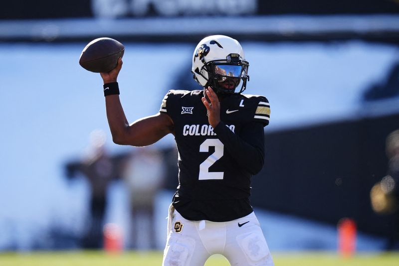 Nov 29, 2024; Boulder, Colorado, USA; Colorado Buffaloes quarterback Shedeur Sanders (2) prepares to pass the ball in the third quarter against the Oklahoma State Cowboys at Folsom Field. Mandatory Credit: Ron Chenoy-Imagn Images/ File Photo