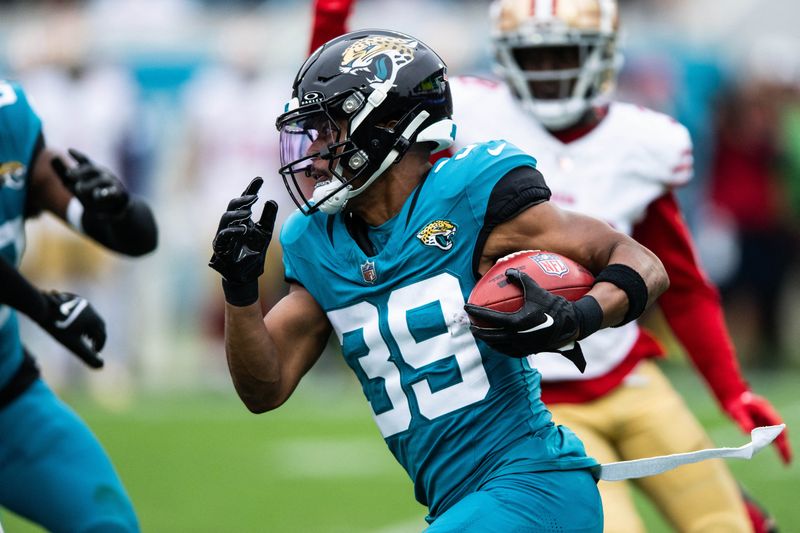 Nov 12, 2023; Jacksonville, Florida, USA; Jacksonville Jaguars wide receiver Jamal Agnew (39) runs with the ball against the San Fransisco 49ers in the first quarter at EverBank Stadium. Mandatory Credit: Jeremy Reper-USA TODAY Sports/ File Photo