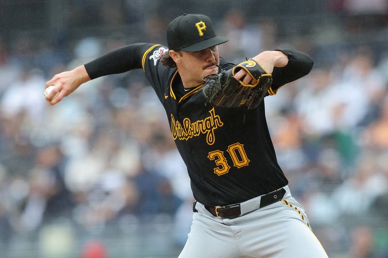 FILE PHOTO: Sep 28, 2024; Bronx, New York, USA; Pittsburgh Pirates starting pitcher Paul Skenes (30) pitches against the New York Yankees during the first inning at Yankee Stadium. Mandatory Credit: Brad Penner-Imagn Images/File Photo