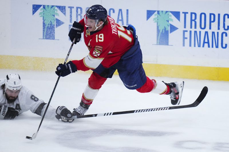 FILE PHOTO: Jan 29, 2025; Sunrise, Florida, USA; Florida Panthers left wing Matthew Tkachuk (19) shoots to score against the Los Angeles Kings during the third period at Amerant Bank Arena. Mandatory Credit: Rich Storry-Imagn Images/File Photo