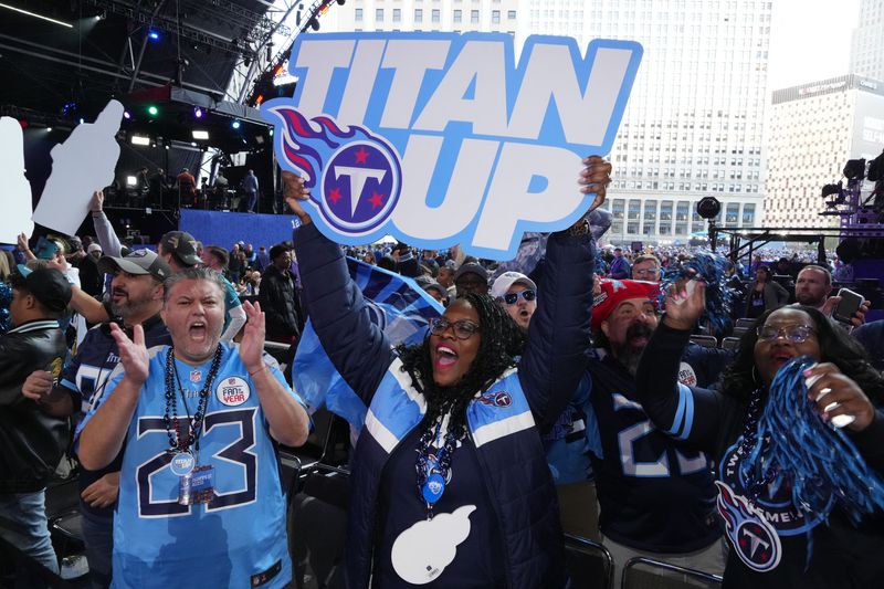 FILE PHOTO: Apr 25, 2024; Detroit, MI, USA; Tennessee Titans fans cheer during the 2024 NFL Draft at Campus Martius Park and Hart Plaza. Mandatory Credit: Kirby Lee-USA TODAY Sports/File Photo