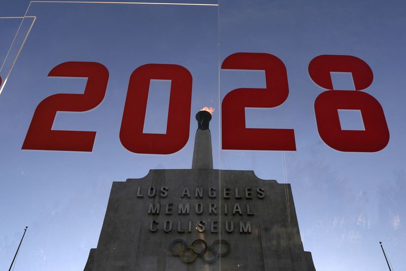 FILE PHOTO: An LA2028 sign is seen at the Los Angeles Coliseum to celebrate Los Angeles being awarded the 2028 Olympic Games, in Los Angeles, California, U.S., September 13, 2017. REUTERS/Lucy Nicholson/File Photo