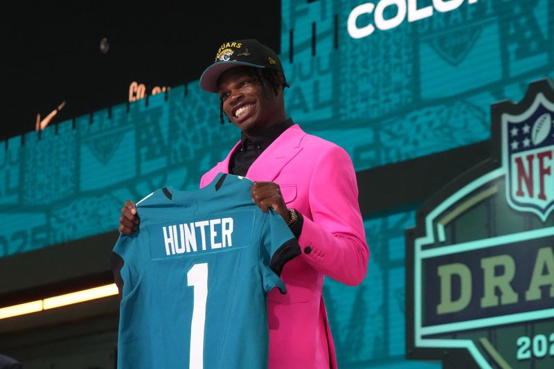 Apr 24, 2025; Green Bay, WI, USA; Colorado Buffaloes wide receiver Travis Hunter is selected by the Jacksonville Jaguars as the number two pick in the first round of the 2025 NFL Draft at Lambeau Field. Mandatory Credit: Kirby Lee-Imagn Images