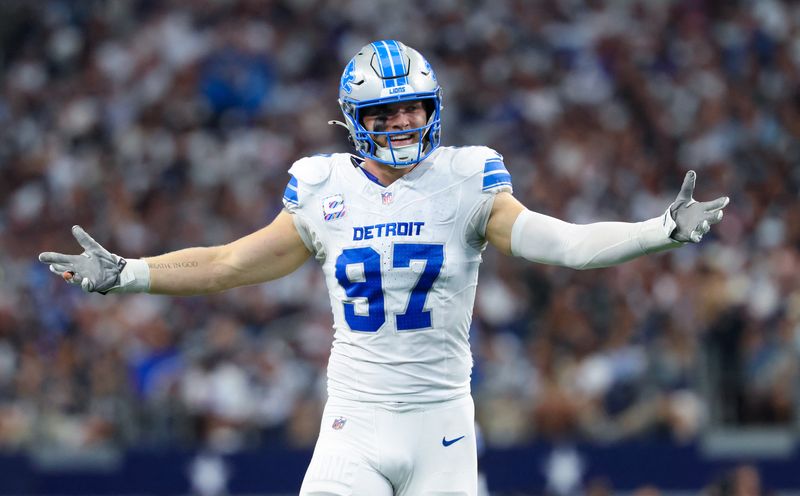 FILE PHOTO: Oct 13, 2024; Arlington, Texas, USA;  Detroit Lions defensive end Aidan Hutchinson (97) reacts during the second quarter against the Dallas Cowboys at AT&T Stadium. Mandatory Credit: Kevin Jairaj-Imagn Images/File Photo