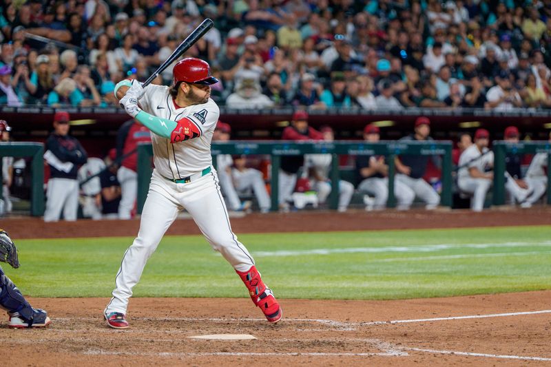 Apr 26, 2025; Phoenix, Arizona, USA;  Arizona Diamondbacks infielder Eugenio Suarez (28) his fourth home run of the game against the Atlanta Braves during the ninth inning at Chase Field. Mandatory Credit: Allan Henry-Imagn Images