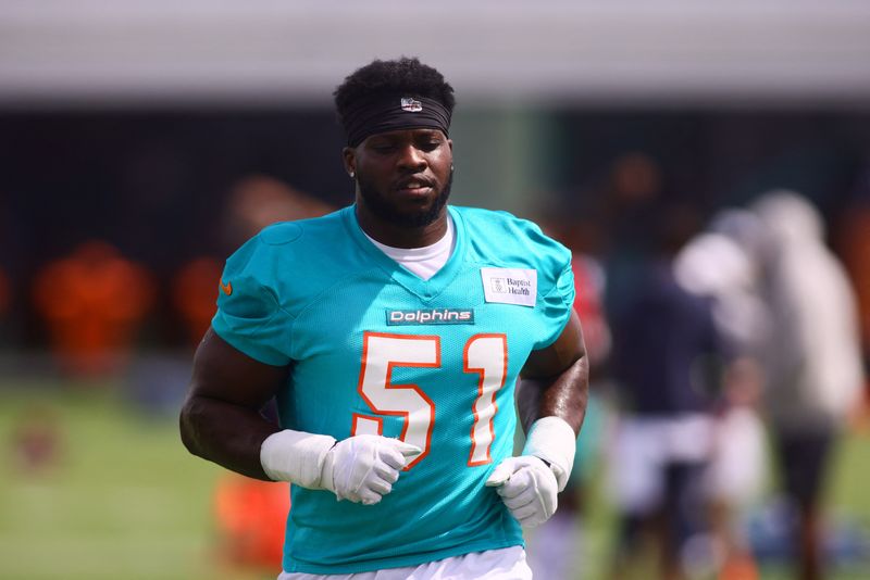 Jul 28, 2024; Miami Gardens, FL, USA; Miami Dolphins linebacker Emmanuel Ogbah (51) works out during training camp at Baptist Health Training Complex. Mandatory Credit: Sam Navarro-USA TODAY Sports/File Photo