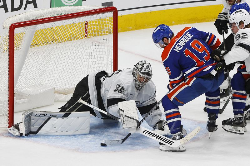 FILE PHOTO: Apr 27, 2025; Edmonton, Alberta, CAN; Los Angeles Kings goaltender Darcy Kuemper (35) makes a save on  ion Edmonton Oilers forward Adam Henrique (19) during overtime in game four of the first round of the 2025 Stanley Cup Playoffs at Rogers Place. Mandatory Credit: Perry Nelson-Imagn Images/File Photo
