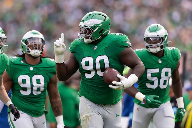 FILE PHOTO: Dec 29, 2024; Philadelphia, Pennsylvania, USA; Philadelphia Eagles defensive tackle Jordan Davis (90) celebrate with teammates after his fumble recovery against the Dallas Cowboys during the second quarter at Lincoln Financial Field. Mandatory Credit: Bill Streicher-Imagn Images/FIle Photo