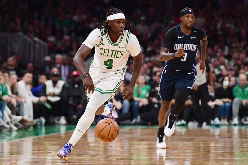 FILE PHOTO: Apr 20, 2025; Boston, Massachusetts, USA; Boston Celtics guard Jrue Holiday (4) controls the ball during the second half against the Orlando Magic at TD Garden. Mandatory Credit: Bob DeChiara-Imagn Images/File Photo