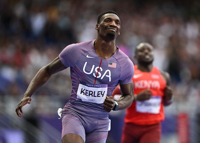 FILE PHOTO: Paris 2024 Olympics - Athletics - Men's 100m Semi-Final 3 - Stade de France, Saint-Denis, France - August 04, 2024. Fred Kerley of United States reacts after finishing semi-final 3 in second place REUTERS/Dylan Martinez/ File Photo