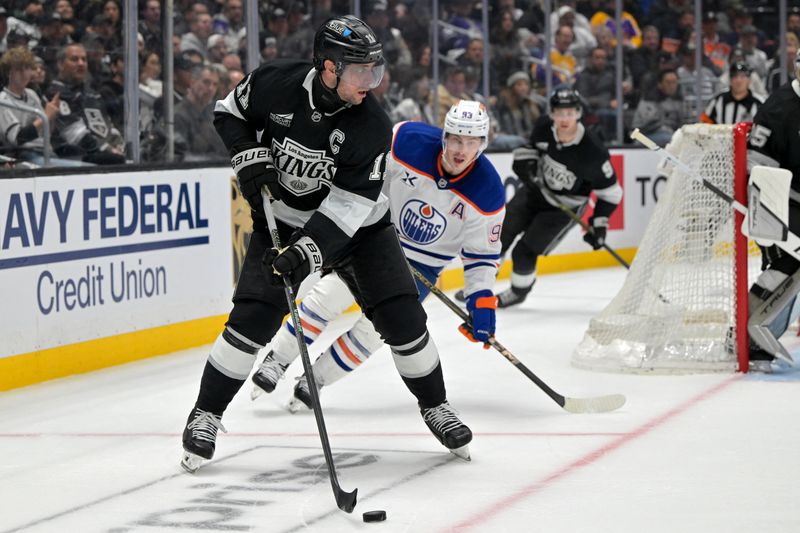FILE PHOTO: Apr 23, 2025; Los Angeles, California, USA; Los Angeles Kings center Anze Kopitar (11) handles the puck in the third period of game 2 of the 2025 Stanley Cup Playoffs against the Edmonton Oilers at Crypto.com Arena. Mandatory Credit: Jayne Kamin-Oncea-Imagn Images/File Photo