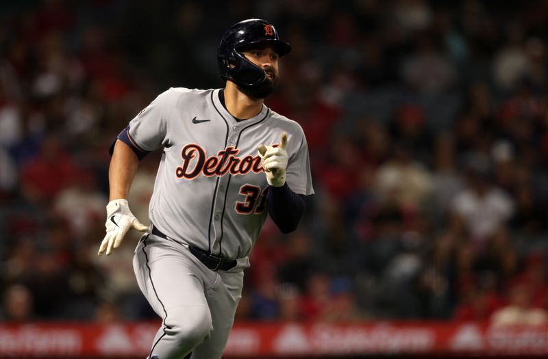 May 2, 2025; Anaheim, California, USA; Detroit Tigers outfielder Riley Greene (31) runs the bases after hitting a home run during the ninth inning against the Los Angeles Angels at Angel Stadium. Jason Parkhurst-Imagn Images