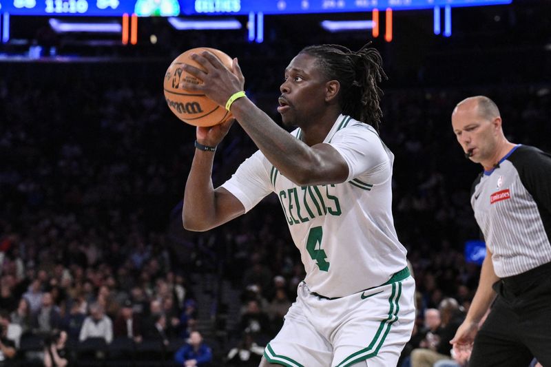 FILE PHOTO: Apr 8, 2025; New York, New York, USA; Boston Celtics guard Jrue Holiday (4) shoots the ball during the second half against the New York Knicks at Madison Square Garden. Mandatory Credit: John Jones-Imagn Images/File Photo