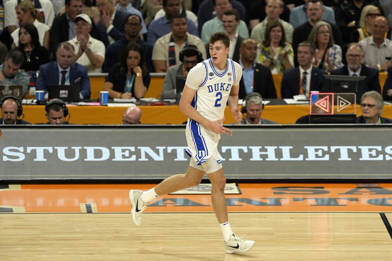 FILE PHOTO: Apr 5, 2025; San Antonio, TX, USA; Duke Blue Devils forward Cooper Flagg (2) reacts against the Houston Cougars during the first half in the semifinals of the men's Final Four of the 2025 NCAA Tournament at Alamodome. Scott Wachter-Imagn Images/ File Photo