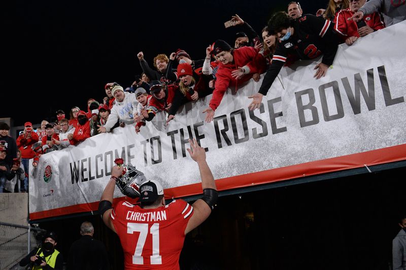 FILE PHOTO: Jan 1, 2022; Pasadena, CA, USA; Ohio State Buckeyes offensive lineman Ben Christman (71) celebrates as he leaves the field after defeating the Utah Utes during the 2022 Rose Bowl college football game at the Rose Bowl. Mandatory Credit: Orlando Ramirez-USA TODAY Sports/File Photo