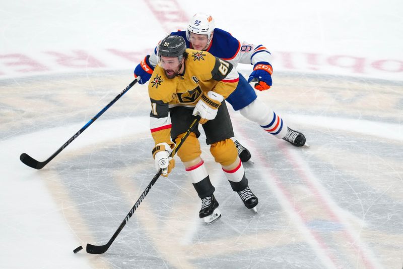 May 8, 2025; Las Vegas, Nevada, USA; Vegas Golden Knights right wing Mark Stone (61) skates away from Edmonton Oilers right wing Vasily Podkolzin (92) during an overtime period of game two of the second round of the 2025 Stanley Cup Playoffs against the Edmonton Oilers at T-Mobile Arena. Stephen R. Sylvanie-Imagn Images/File Photo
