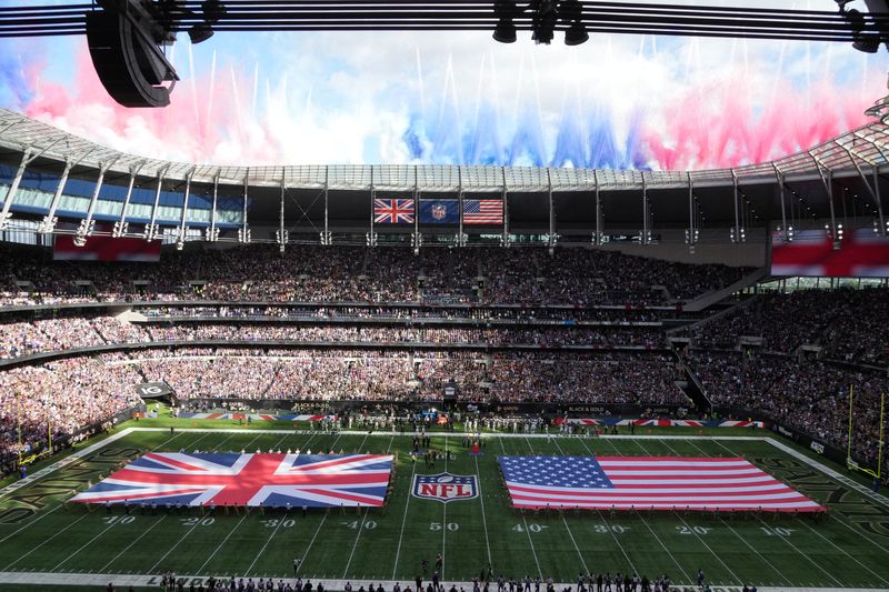FILE PHOTO: Oct 2, 2022; London, United Kingdom; A general overall view of British and United Stages flags on the field during the playing of the national anthem before an NFL International Series game between the New Orleans Saints and the Minnesota Vikings at Tottenham Hotspur Stadium. Mandatory Credit: Kirby Lee-USA TODAY Sports/File Photo