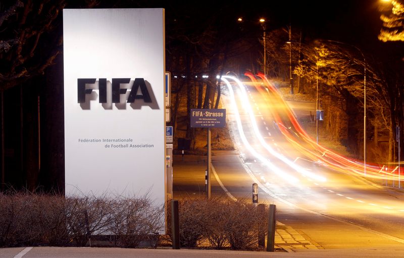 FILE PHOTO: A long exposure shows FIFA's logo near its headquarters in Zurich, Switzerland February 27, 2022. REUTERS/Arnd Wiegmann/File Photo