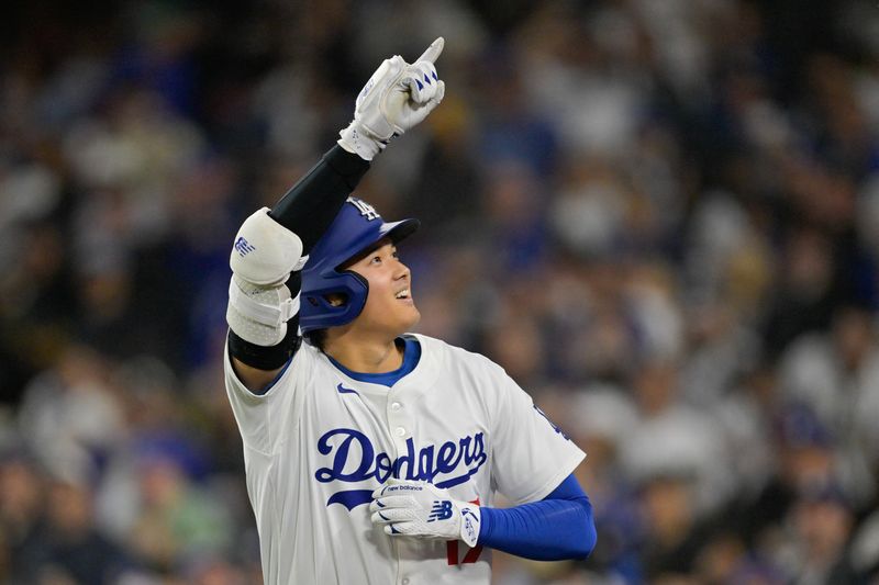 May 15, 2025; Los Angeles, California, USA; Los Angeles Dodgers designated hitter Shohei Ohtani (17) celebrates after hitting a three-run home run against the Athletics during the third inning of the game at Dodger Stadium. Mandatory Credit: Jayne Kamin-Oncea-Imagn Images