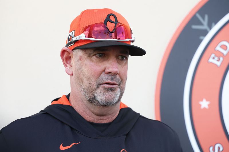 FILE PHOTO: Feb 13, 2025; Sarasota, FL, USA; Baltimore Orioles manager Brandon Hyde talks with media during spring training workouts at Ed Smith Stadium. Mandatory Credit: Kim Klement Neitzel-Imagn Images/File Photo