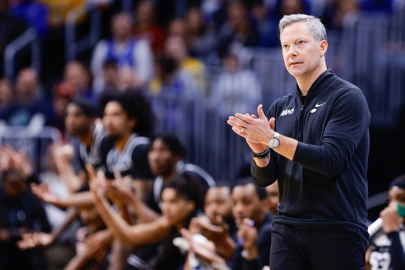 FILE PHOTO: Mar 20, 2025; Denver, CO, USA; VCU Rams head coach Ryan Odom reacts during the first half against the Brigham Young Cougars in the first round of the NCAA Tournament at Ball Arena. Mandatory Credit: Isaiah J. Downing-Imagn Images/File Photo